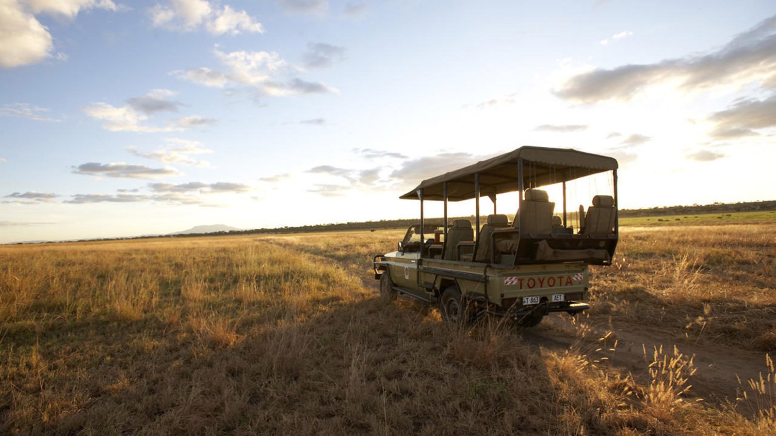 Open sided safari land cruiser in Tanzania